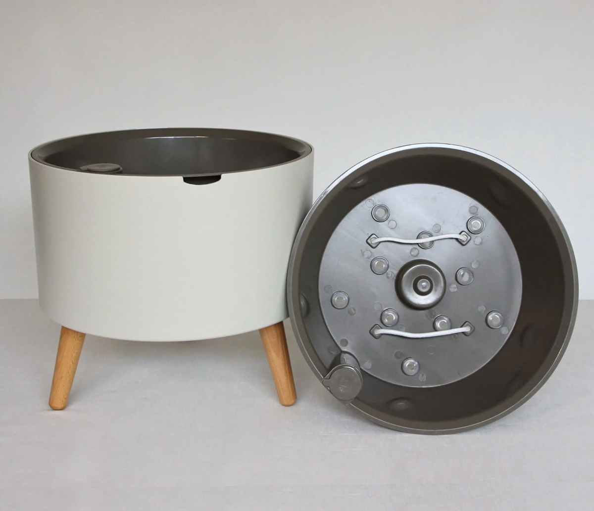 Every part of a Thirsty Pot laid out: outer planter, inner pot, legs, cotton wick and sensor