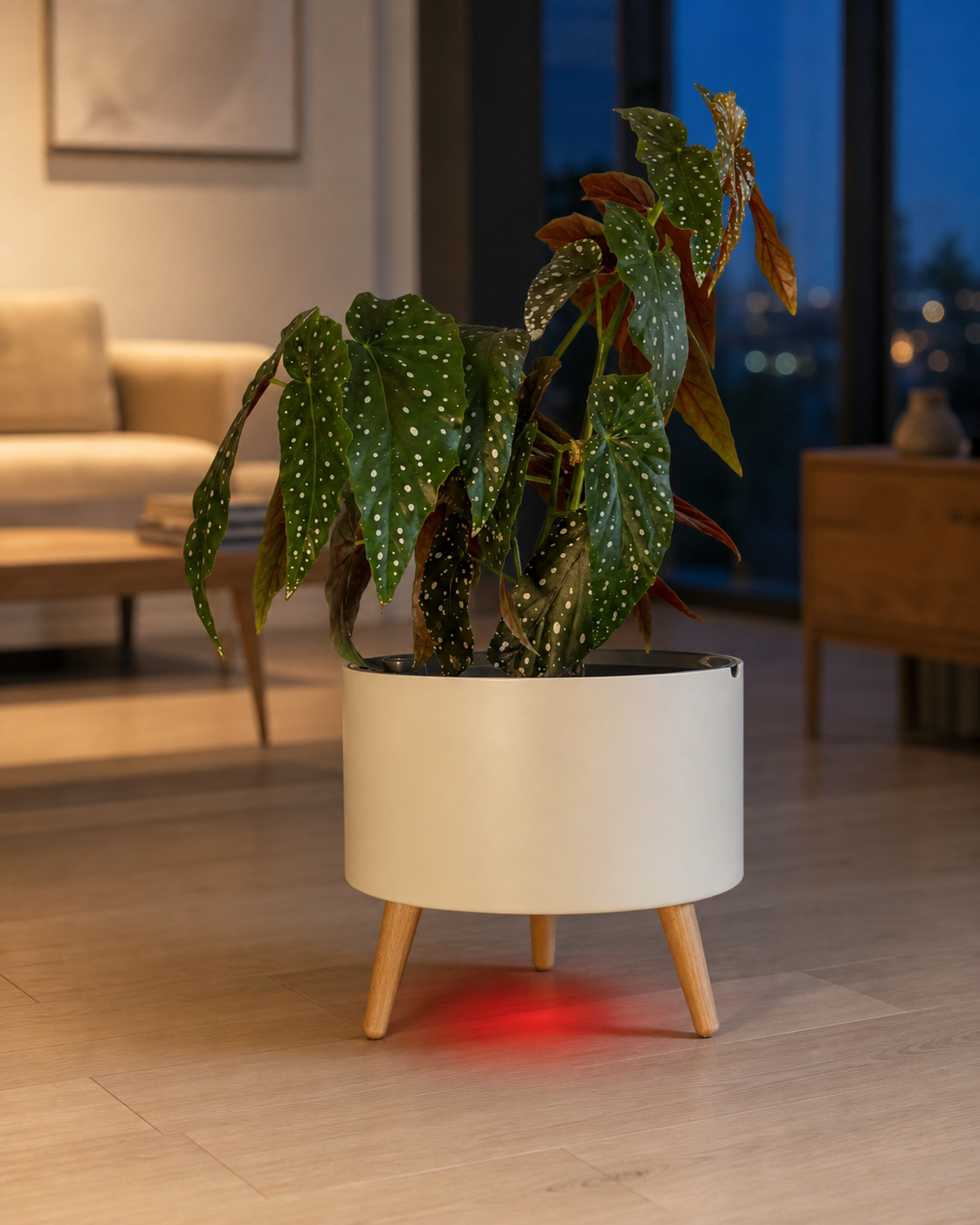 The Classic at night in a living room, the red refill light pooling on the floor beneath it