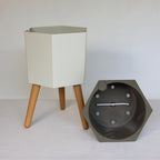 thirstypot hexagon planter studio showing basket next to it